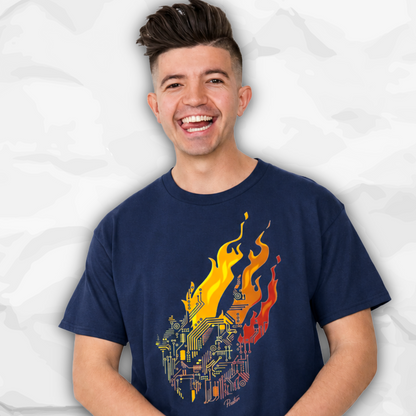 Preston Playz wearing a navy blue t-shirt with a graphic of a computer circuit board on the front, engulfed in yellow, orange, and red flames. The background is a light gray crumpled paper texture.