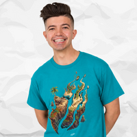 Preston Playz wearing a bright turquoise graphic t-shirt with a detailed illustration of a tropical island on the front, set against a light gray crumpled paper background.