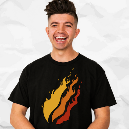 Preston Playz wearing a black crew-neck t-shirt with a stylized flame graphic in yellow, orange, and red on the front, set against a crumpled white paper background.