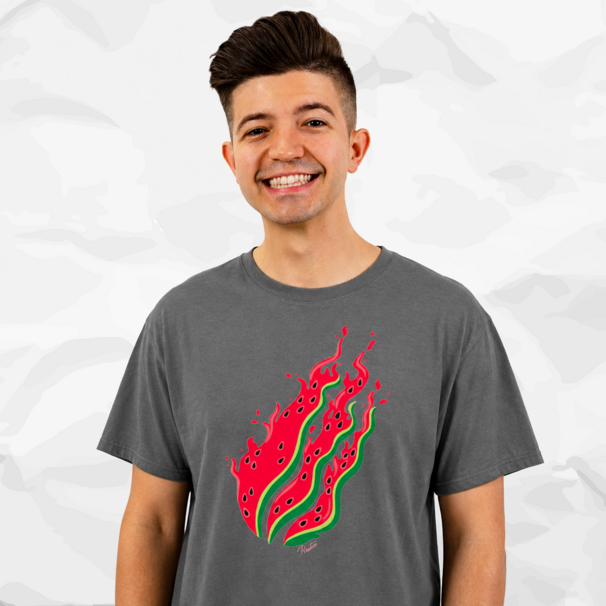 Preston Playz wearing a dark gray t-shirt with a red and green watermelon graphic, set against a light gray crumpled paper background.
